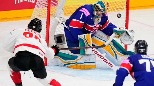 Connor Bedard scores pair in hockey worlds debut to guide Canada previous Nice Britain
